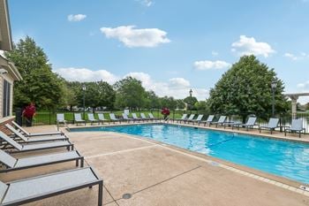 Heated outdoor pool overlooking the beautiful lake